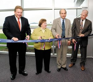 From left, Chairman, Airport Advisory Commission Wayne Alter, U.S. Senator Barbara A. Milkulski (D-Md.), President and CEO of Cape Air/Nantucket Airlines Daniel Wolf and County Commission President John Barr were on hand Tuesday at Hagerstown Regional Airport for a ribbon cutting ceremony for Cape Air Airlines. (By Yvette May/Staff Photographer/)