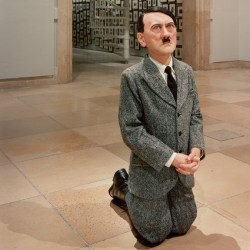 Statue of Hitler kneeling in prayer placed in former Warsaw Jewish ghetto